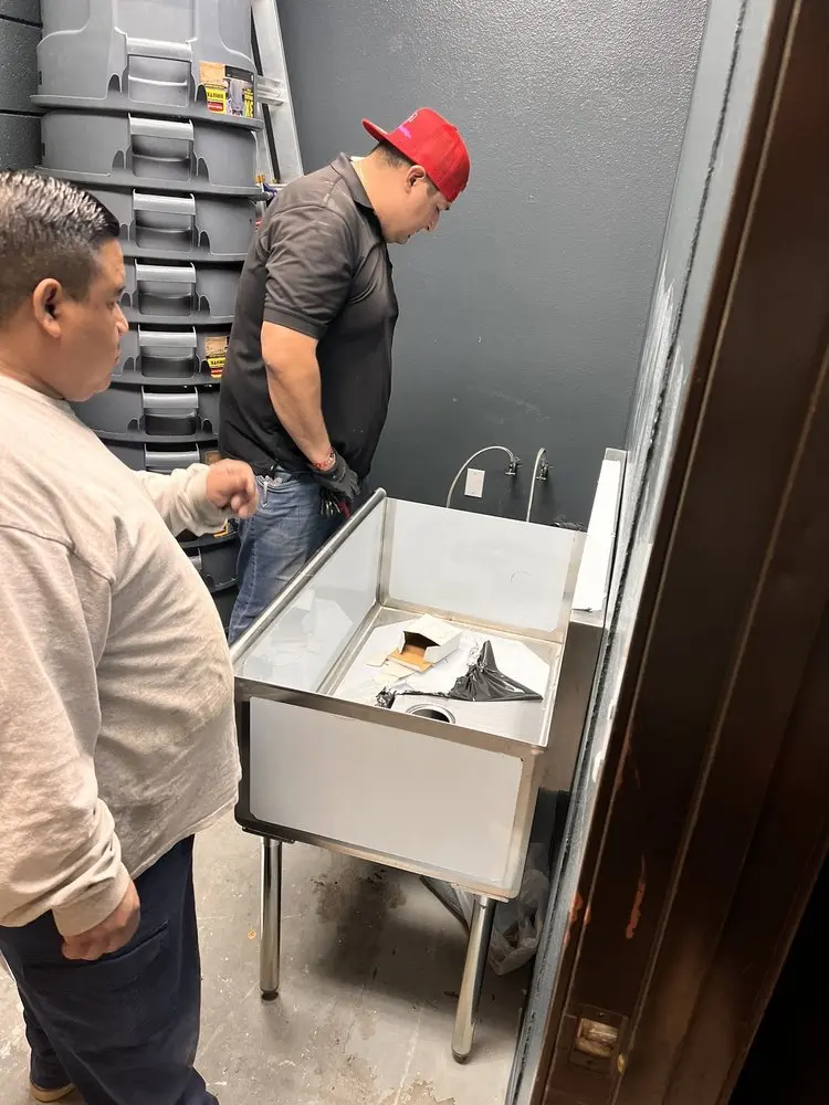 Commercial plumbing and sink installation in Queen Acres